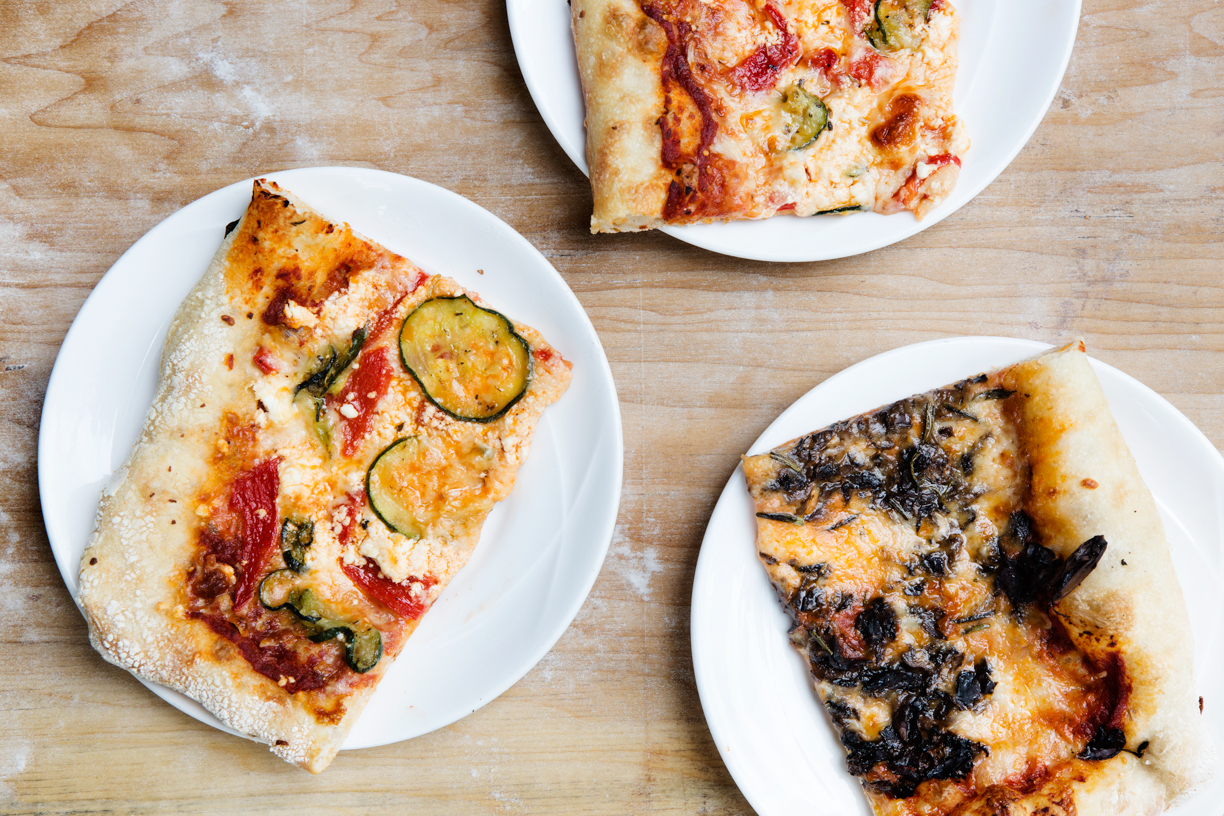 Overhead view of 3 pizza slices